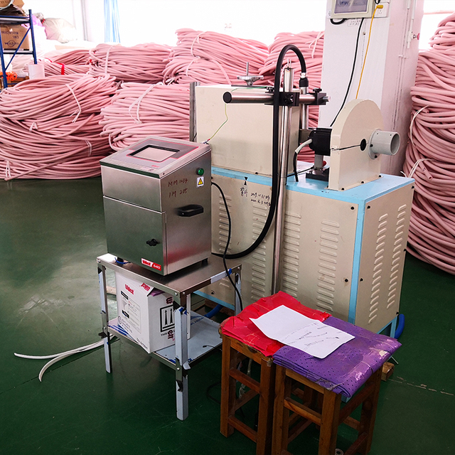 equipment in use for producing insulated pipes at Lukwom