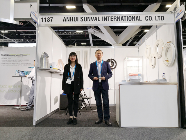 Lukwom exhibition booth showcasing insulated pipes at a trade show